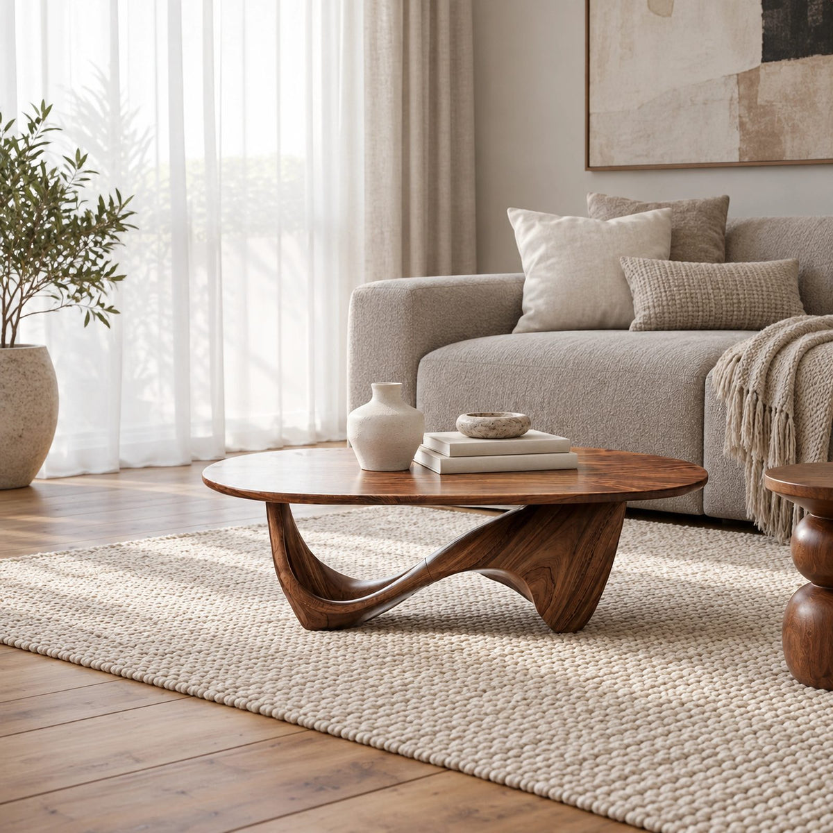 Sculptural Oval Coffee Table With Wave Base For Living Room