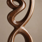 Sculptural Wood Piece With Stacked Figure Eight Loops