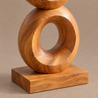 Artisan Wood Sculpture With Stacked Open Rings For Patio