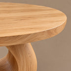 Contemporary Round Dining Table With Sculpted Loop Pedestal For Dining Room