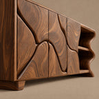Minimalist Sideboard With Sculpted Artistic Doors For Living Room